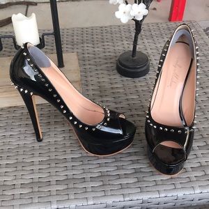 Black heel stilettos with gold spike embellishment